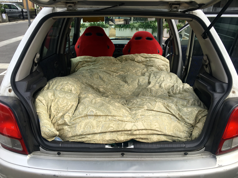 Illustration for article titled How To Turn Your Hatchback Into A Mini-Camper For Cheap Road Trips